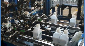 Заповнення пляшок мастилом: точне дозування за вагою з контролерами eNod4-D від Scaime